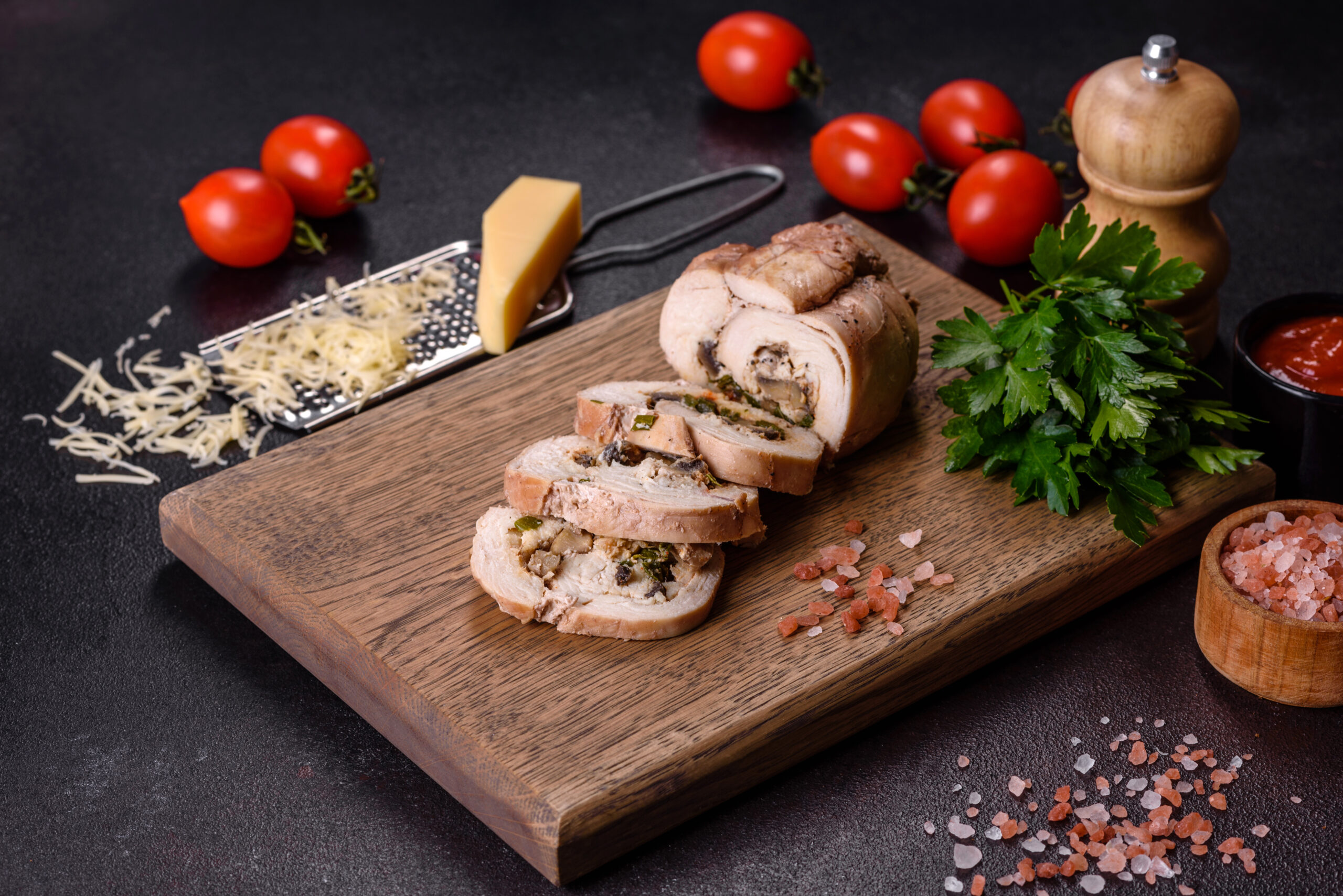 Delicious fresh meat roll made from chicken fillet, mushrooms, spices and herbs. Delicious healthy dish cooked at home